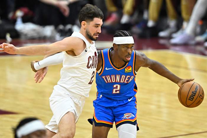 Oct 27, 2023; Cleveland, Ohio, USA; Cleveland Cavaliers guard Ty Jerome (2) defends Oklahoma City Thunder guard Shai Gilgeous-Alexander (2) in the second quarter at Rocket Mortgage FieldHouse.